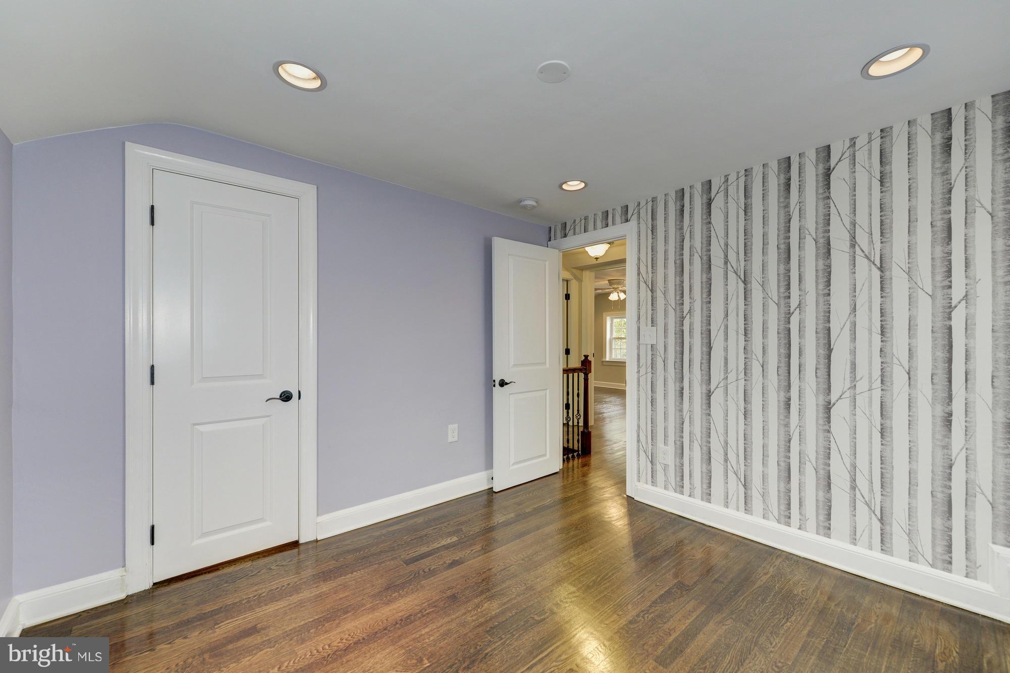 3510 Russell Road Alexandria, VA 22305 - Photo 20 of 30 a view of a hallway with wooden floor