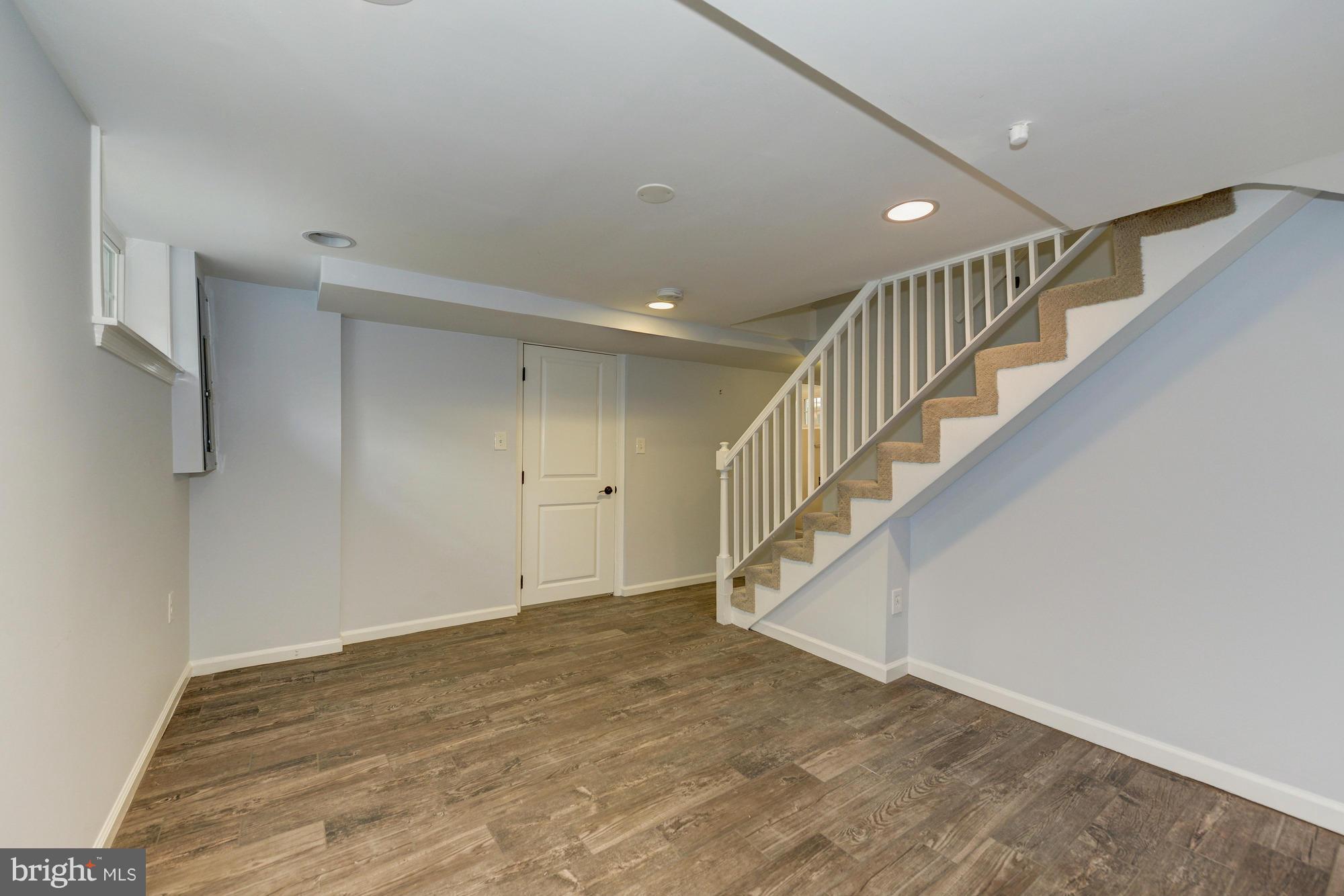 3510 Russell Road Alexandria, VA 22305 - Photo 23 of 30 a view of entryway and hall with wooden floor