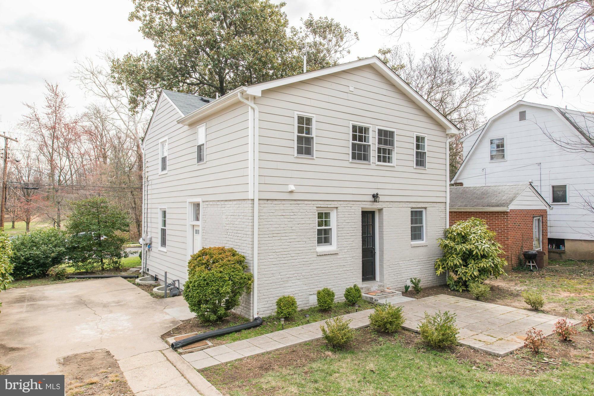 3510 Russell Road Alexandria, VA 22305 - Photo 27 of 30 a front view of a house with garden
