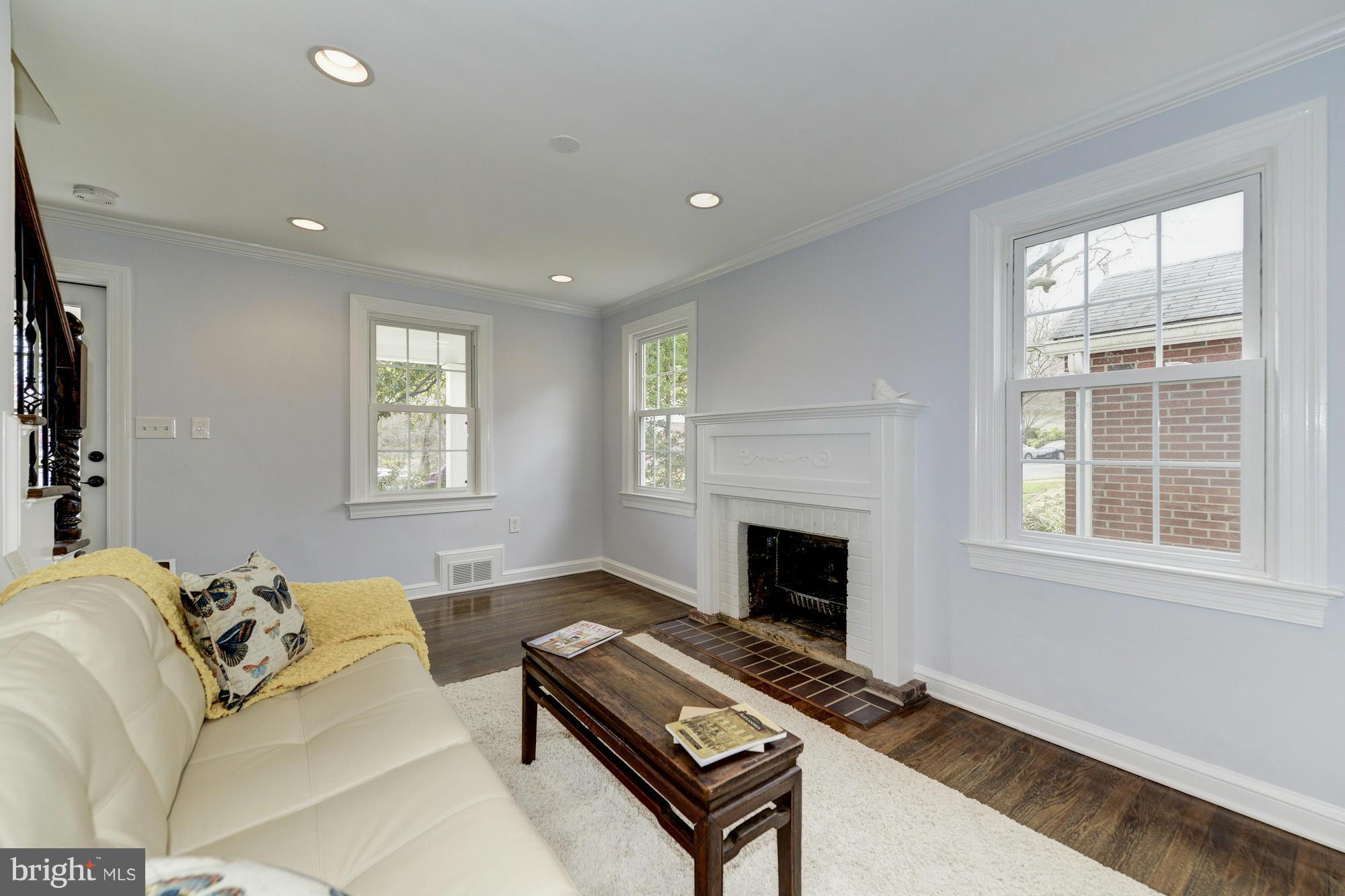 3510 Russell Road Alexandria, VA 22305 - Photo 9 of 30 a living room with furniture fireplace and window