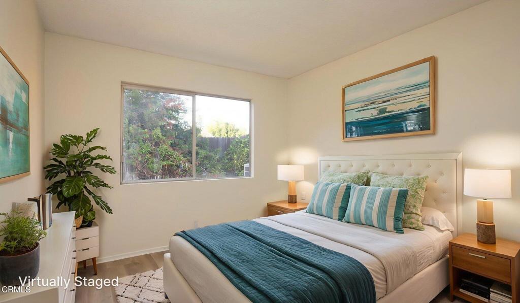 1223 El Encanto Drive Brea, CA 92821 - Photo 17 of 36 a bedroom with bed and a potted plant