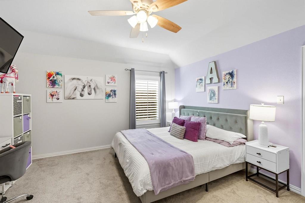 1724 Wassel Road Fort Worth, TX 76052 - Photo 20 of 24 Spacious room featuring a vaulted ceiling and a ceiling fan