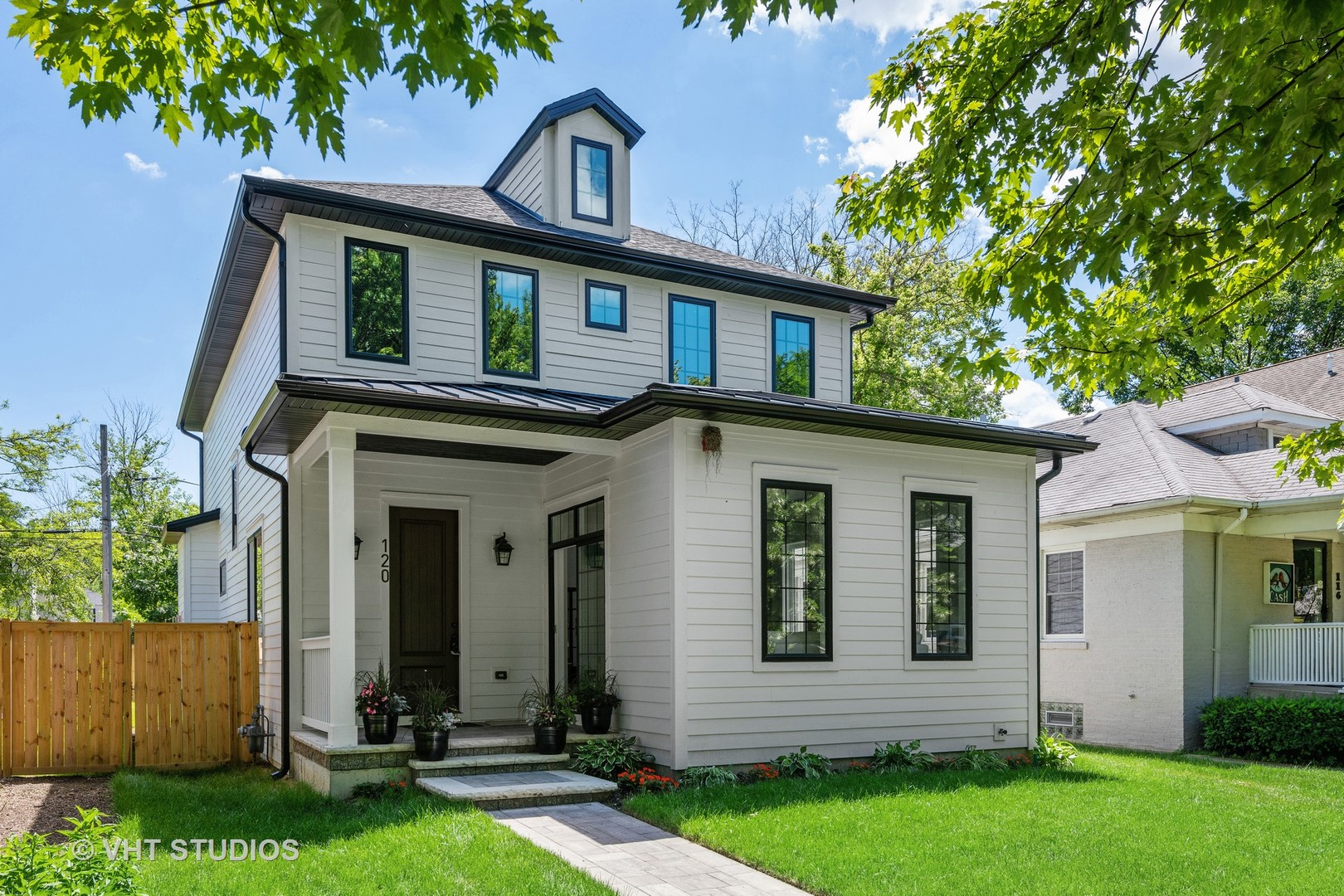 front view of a house with a yard