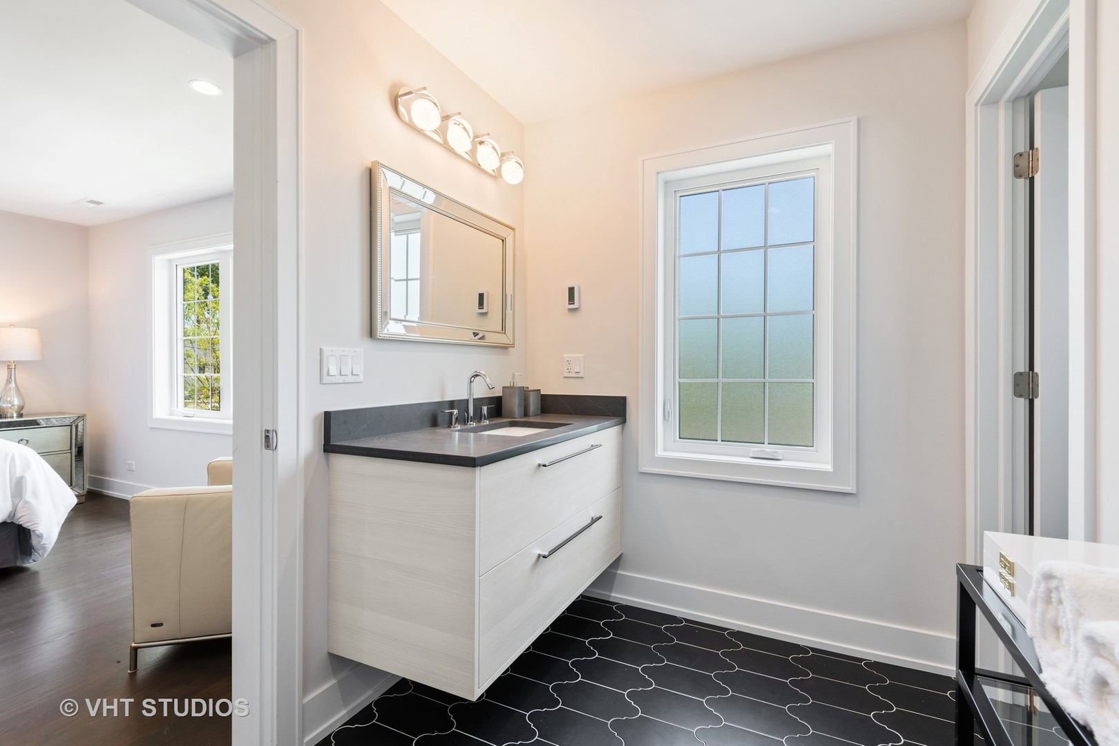 120 16th Street Wilmette, IL 60091 - Photo 17 of 34 a spacious bathroom with a sink and a window