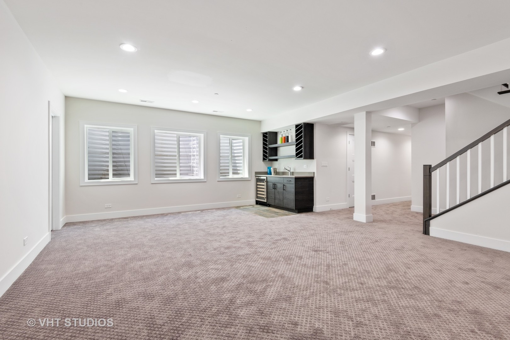 120 16th Street Wilmette, IL 60091 - Photo 25 of 34 a view of an empty room with a window and a kitchen