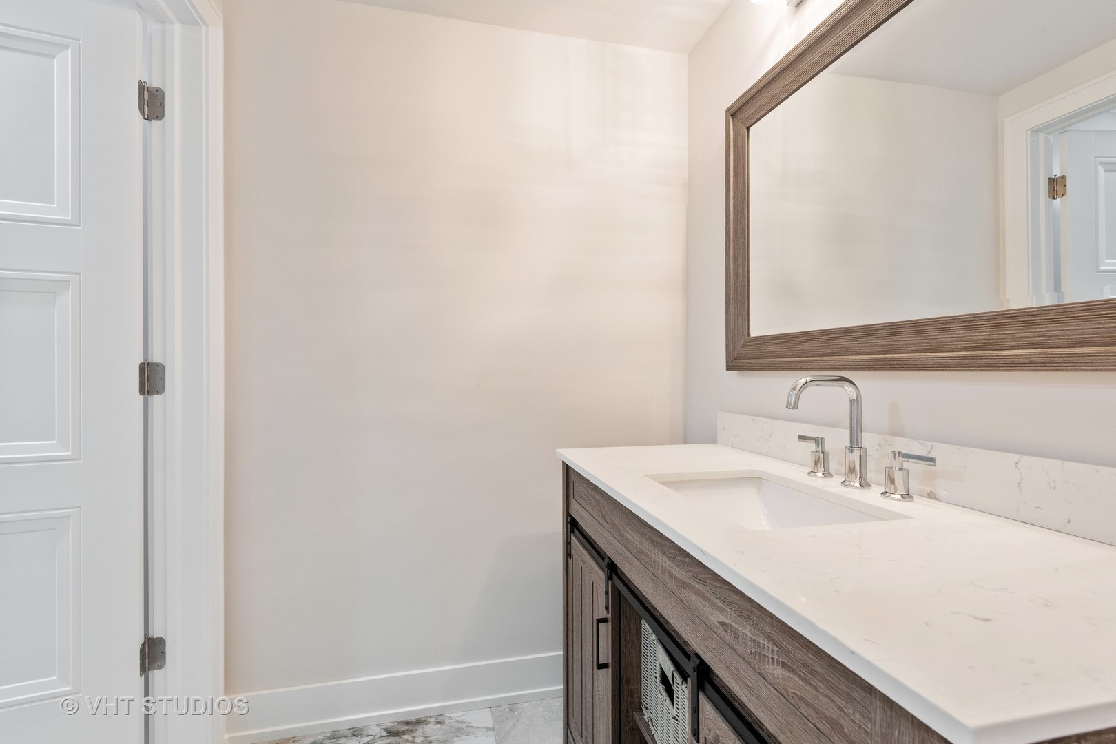 120 16th Street Wilmette, IL 60091 - Photo 28 of 34 a bathroom with a sink a mirror and a vanity