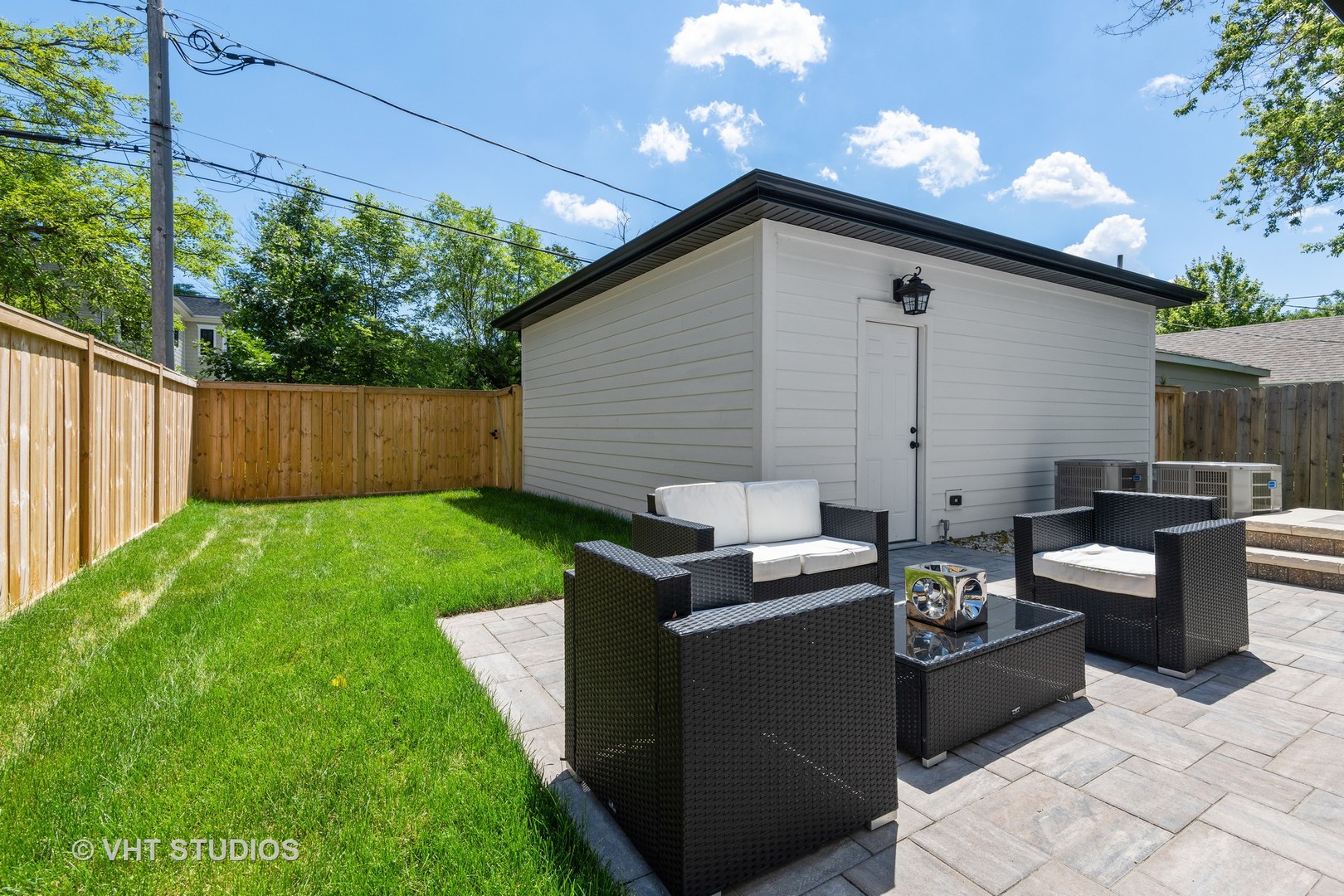 120 16th Street Wilmette, IL 60091 - Photo 30 of 34 a backyard of a house with seating space