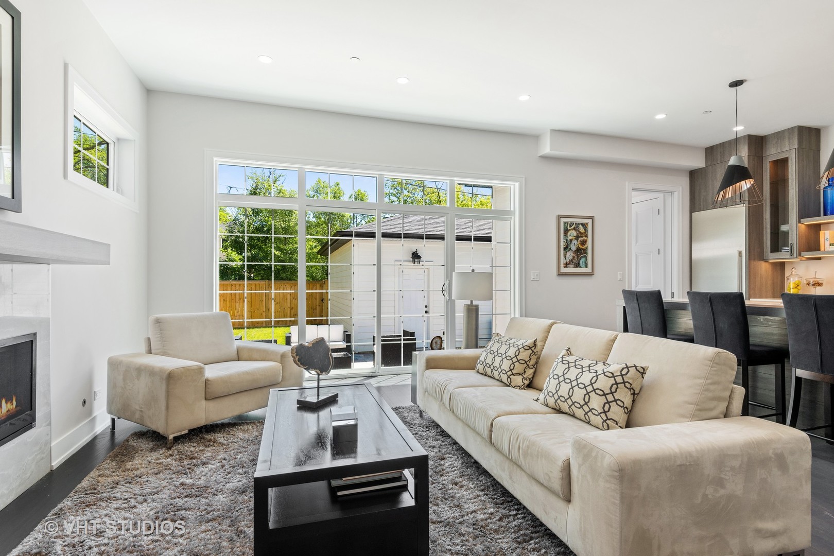 120 16th Street Wilmette, IL 60091 - Photo 9 of 34 a living room with furniture fireplace and a large window