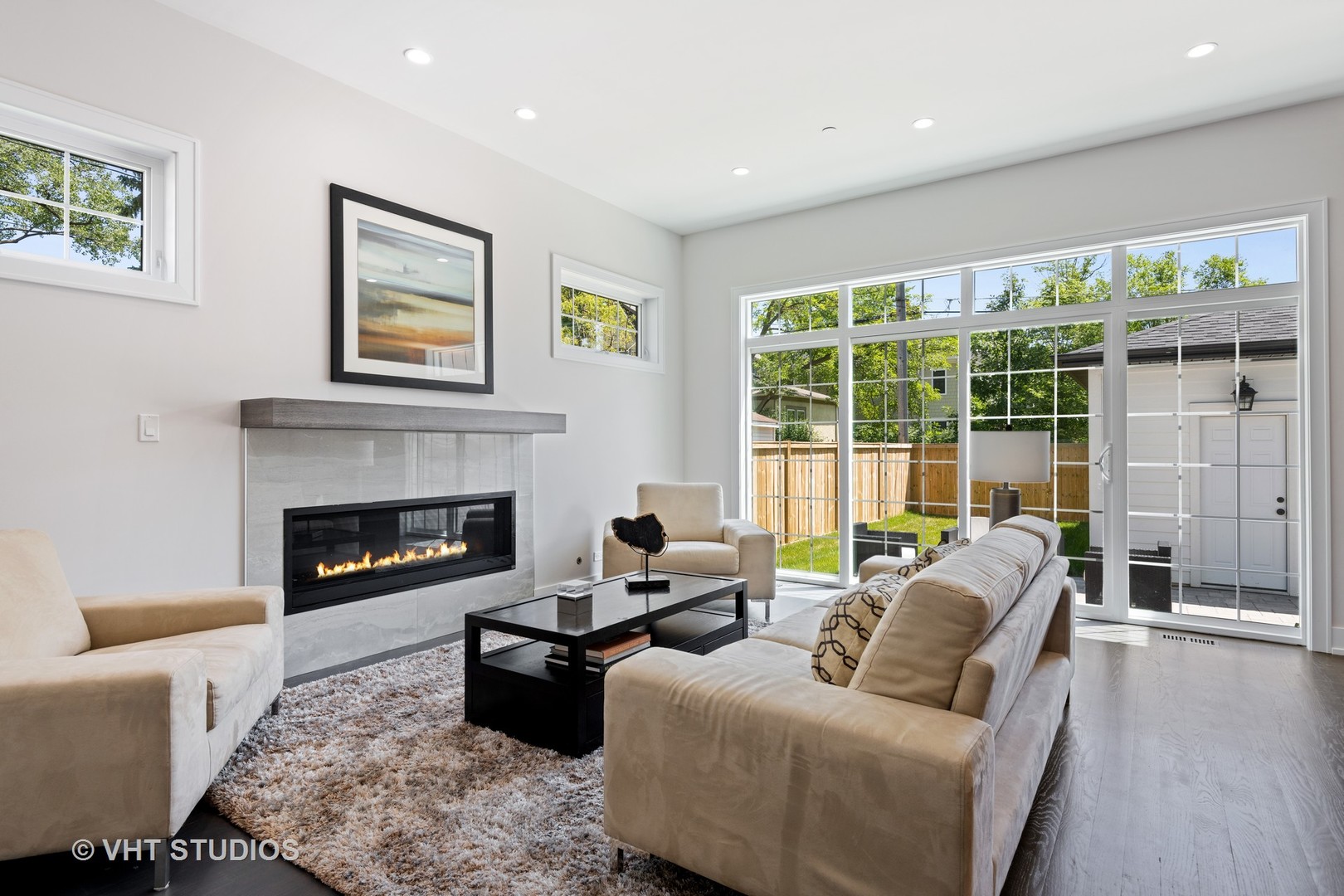 120 16th Street Wilmette, IL 60091 - Photo 10 of 34 a living room with furniture and a fireplace