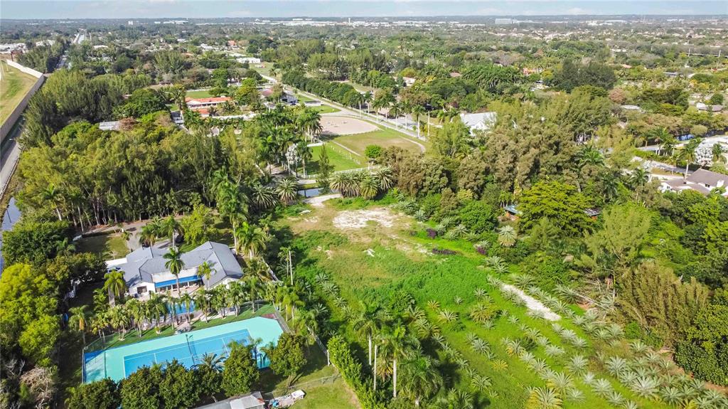 4001 Southwest 126th Avenue Miramar, FL 33027 - Photo 6 of 16 an aerial view of residential houses with outdoor space and trees