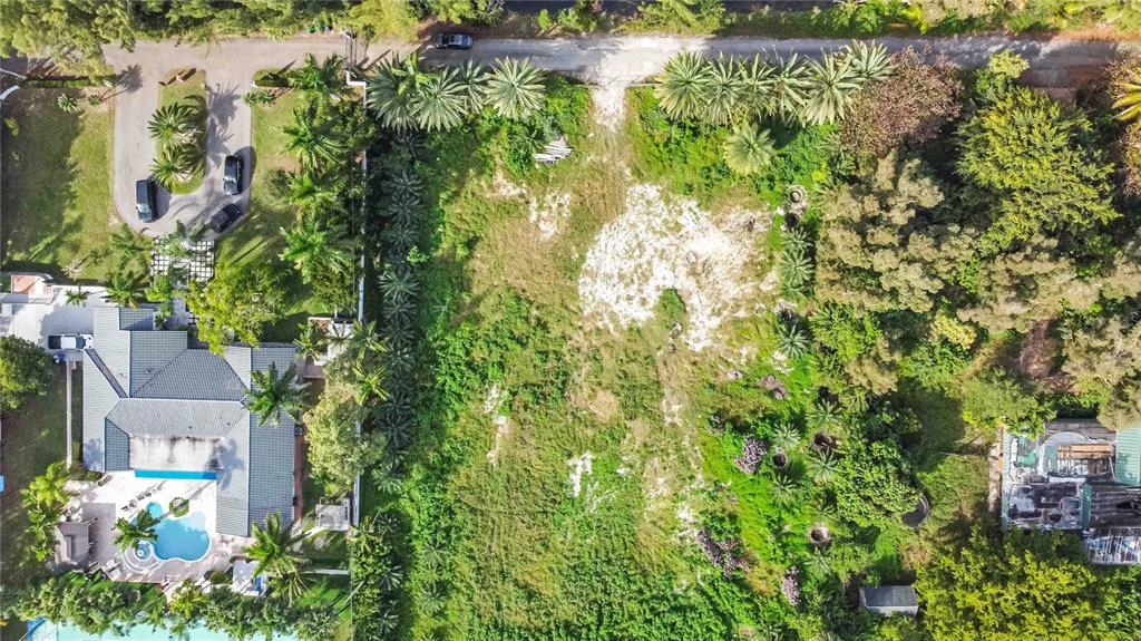 4001 Southwest 126th Avenue Miramar, FL 33027 - Photo 10 of 16 an aerial view of residential houses with outdoor space and trees