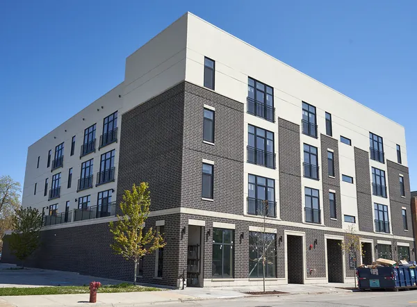 a front view of a building with street view