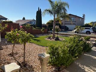 112 Robin Court Hercules, CA 94547 - Photo 13 of 21 a view of a garden with a fountain