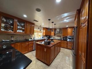 112 Robin Court Hercules, CA 94547 - Photo 15 of 21 a kitchen with stainless steel appliances granite countertop sink stove and cabinets