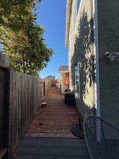 112 Robin Court Hercules, CA 94547 - Photo 17 of 21 a view of a balcony with wooden floor and fence