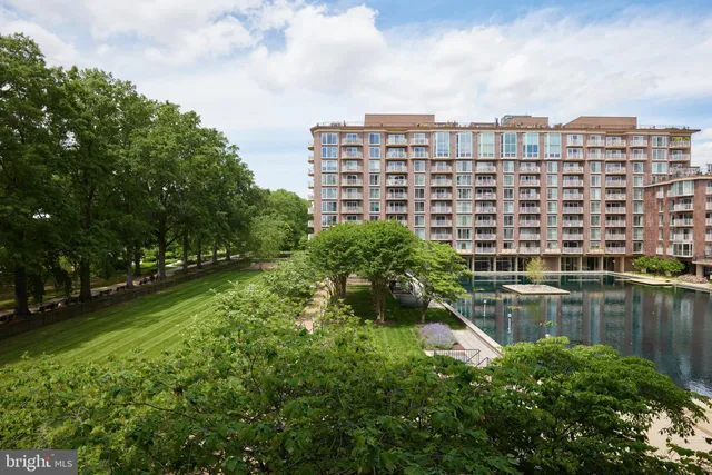 a view of a living room and kitchen