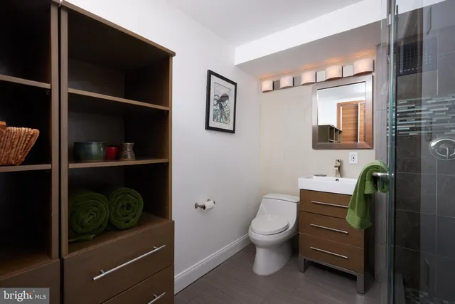 a view of residential houses with outdoor space and lake view