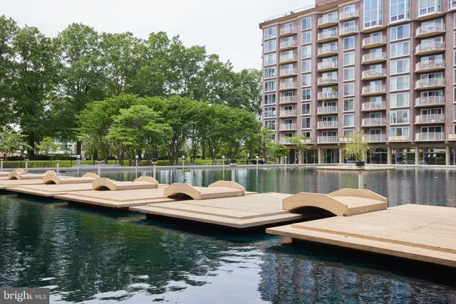 a view of a street with a building in the background