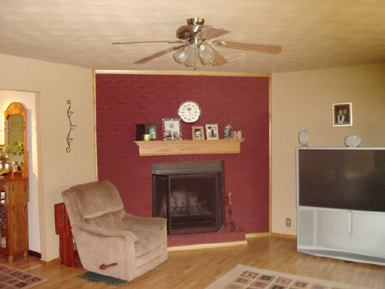 1283 Fischer Road South Beloit, IL 61080 - Photo 3 of 6 a living room with furniture and a fireplace