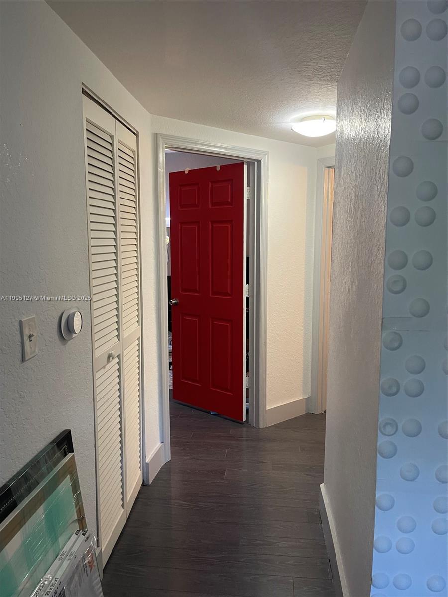 2541 Centergate Drive, Unit 205 Miramar, FL 33025 - Photo 14 of 28 wooden floor in a gallery