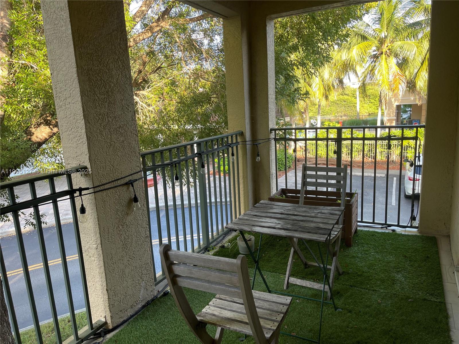 2541 Centergate Drive, Unit 205 Miramar, FL 33025 - Photo 15 of 28 a view of a two chairs in the deck