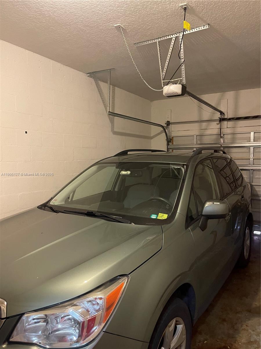 2541 Centergate Drive, Unit 205 Miramar, FL 33025 - Photo 18 of 28 a view of garage