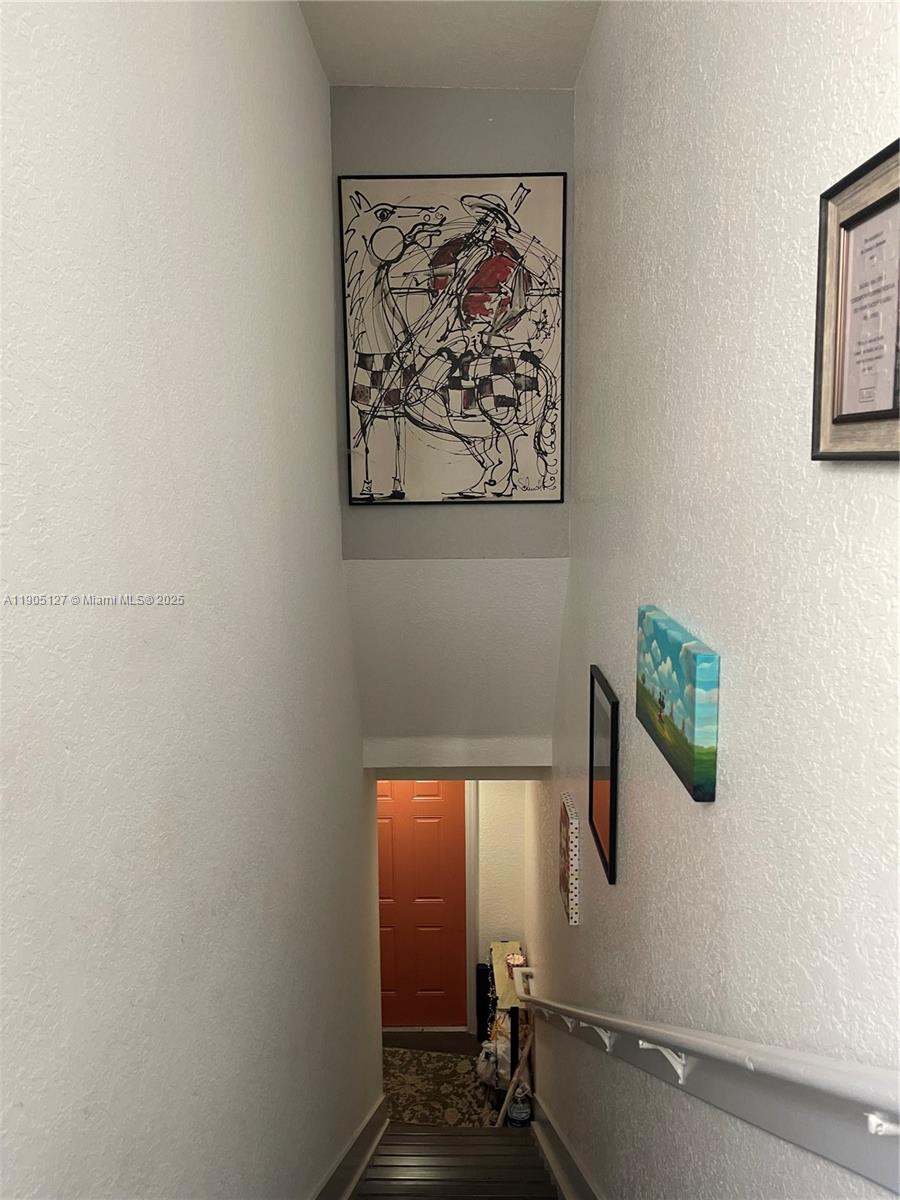 2541 Centergate Drive, Unit 205 Miramar, FL 33025 - Photo 19 of 28 a bathroom with a bathtub and shower