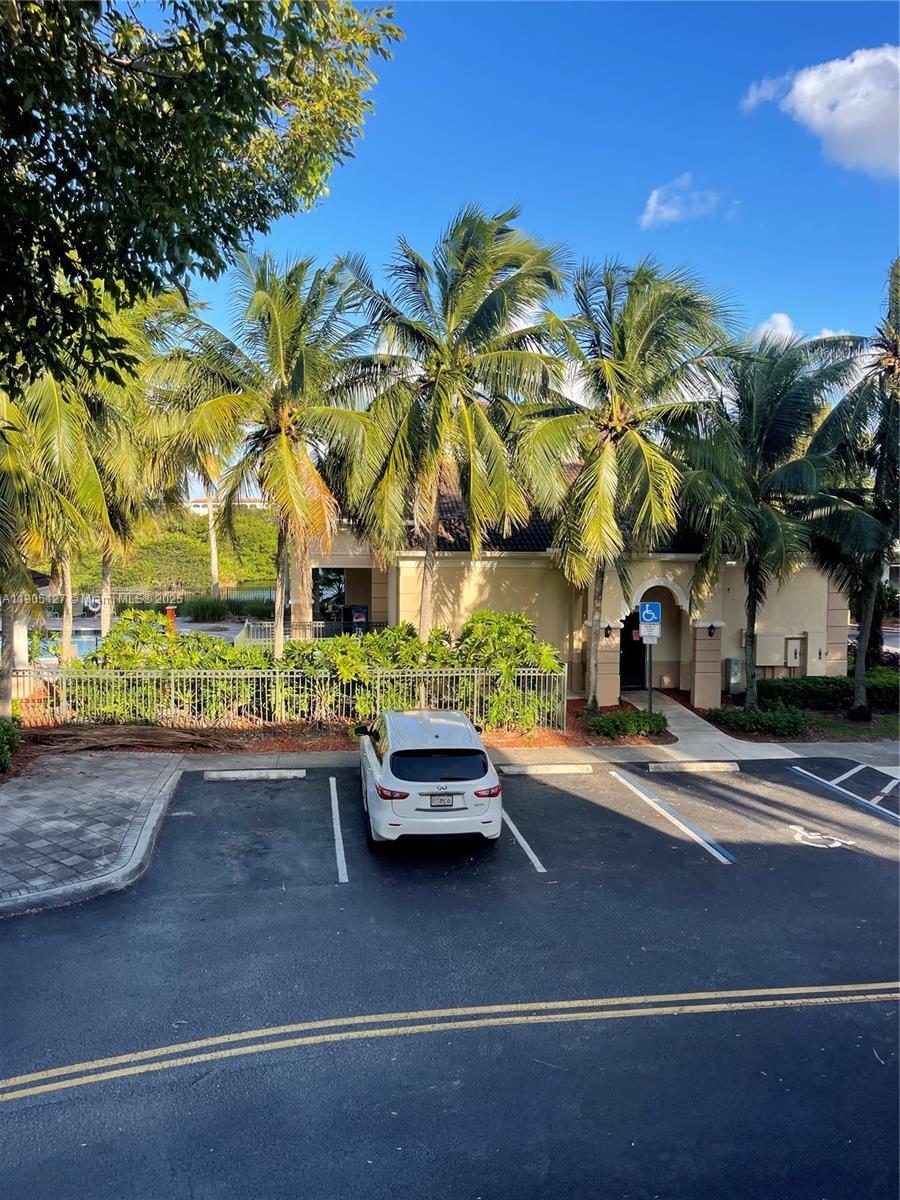 2541 Centergate Drive, Unit 205 Miramar, FL 33025 - Photo 22 of 28 a view of a yard with furniture