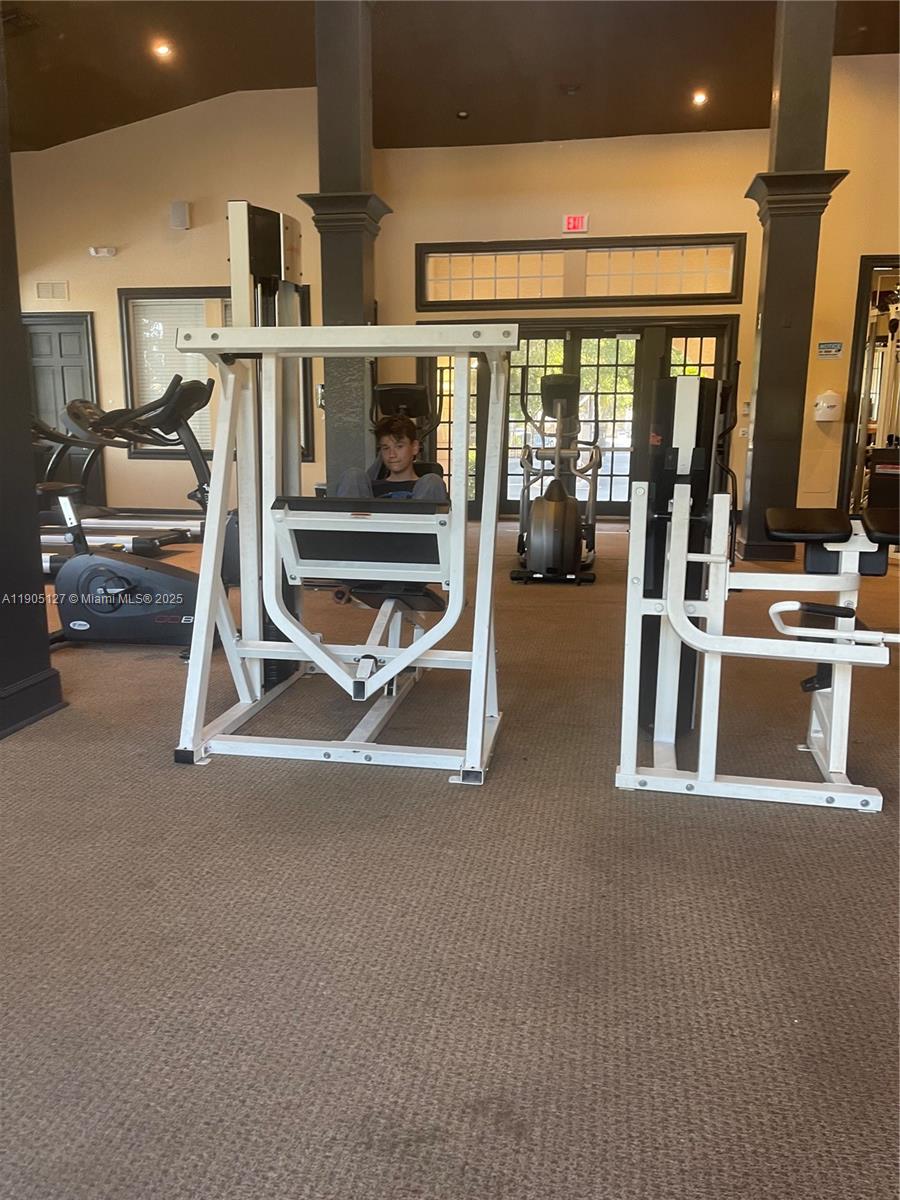 2541 Centergate Drive, Unit 205 Miramar, FL 33025 - Photo 26 of 28 a view of a room with gym equipment