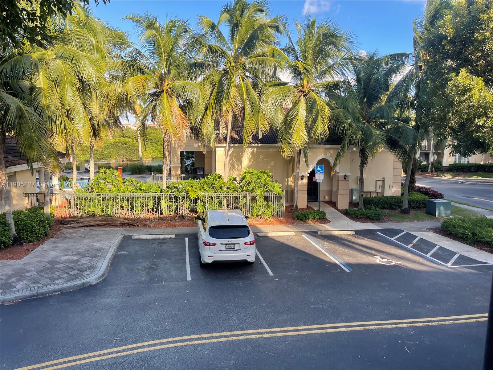 2541 Centergate Drive, Unit 205 Miramar, FL 33025 - Photo 27 of 28 a view of a house with outdoor space and street view