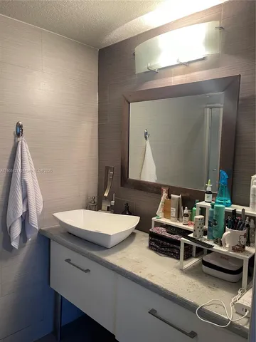 a room with furniture and a mirror