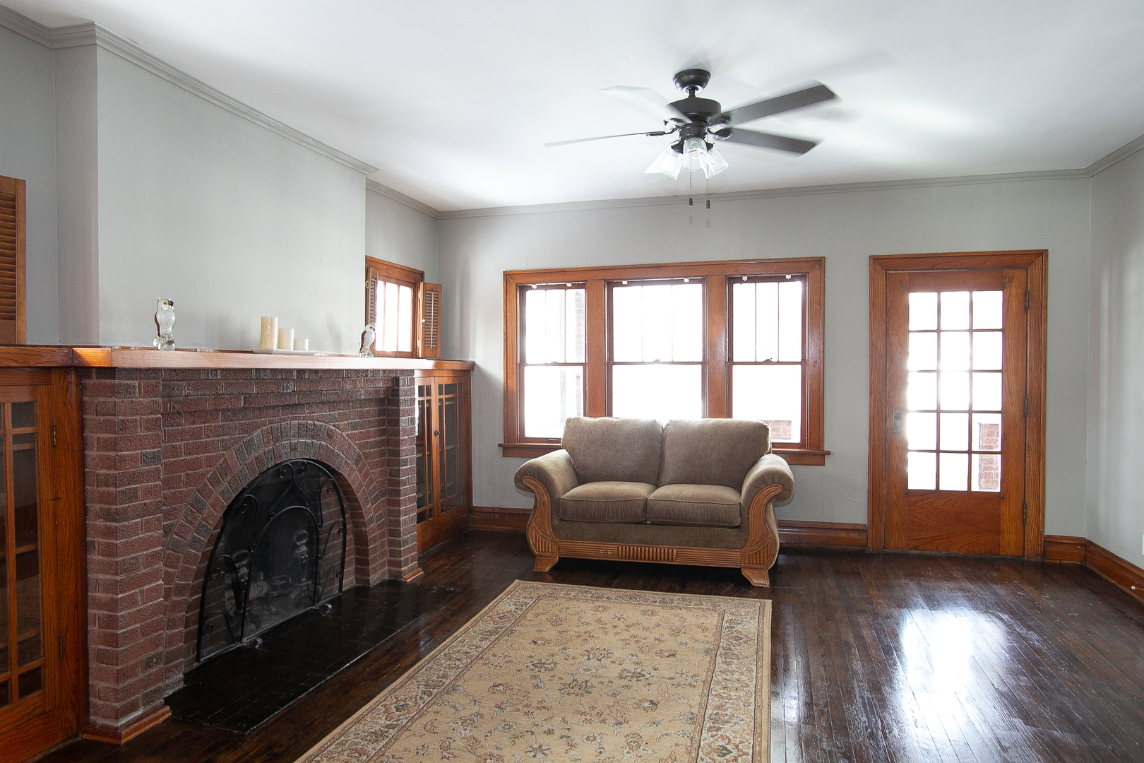 1659 Linden Road Homewood, IL 60430 - Photo 16 of 32 a living room with furniture and a fireplace
