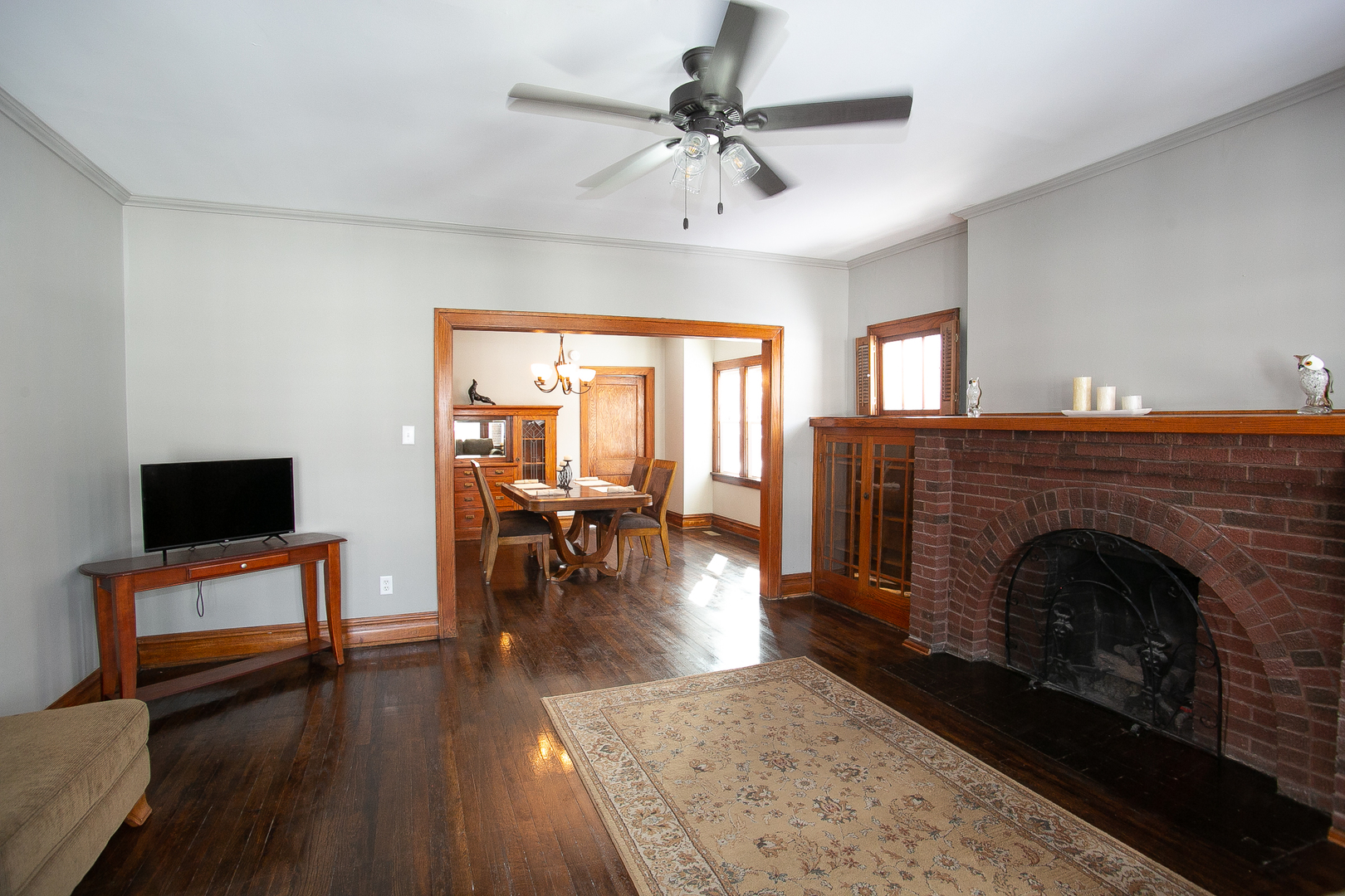 1659 Linden Road Homewood, IL 60430 - Photo 17 of 32 a living room with furniture and a fireplace