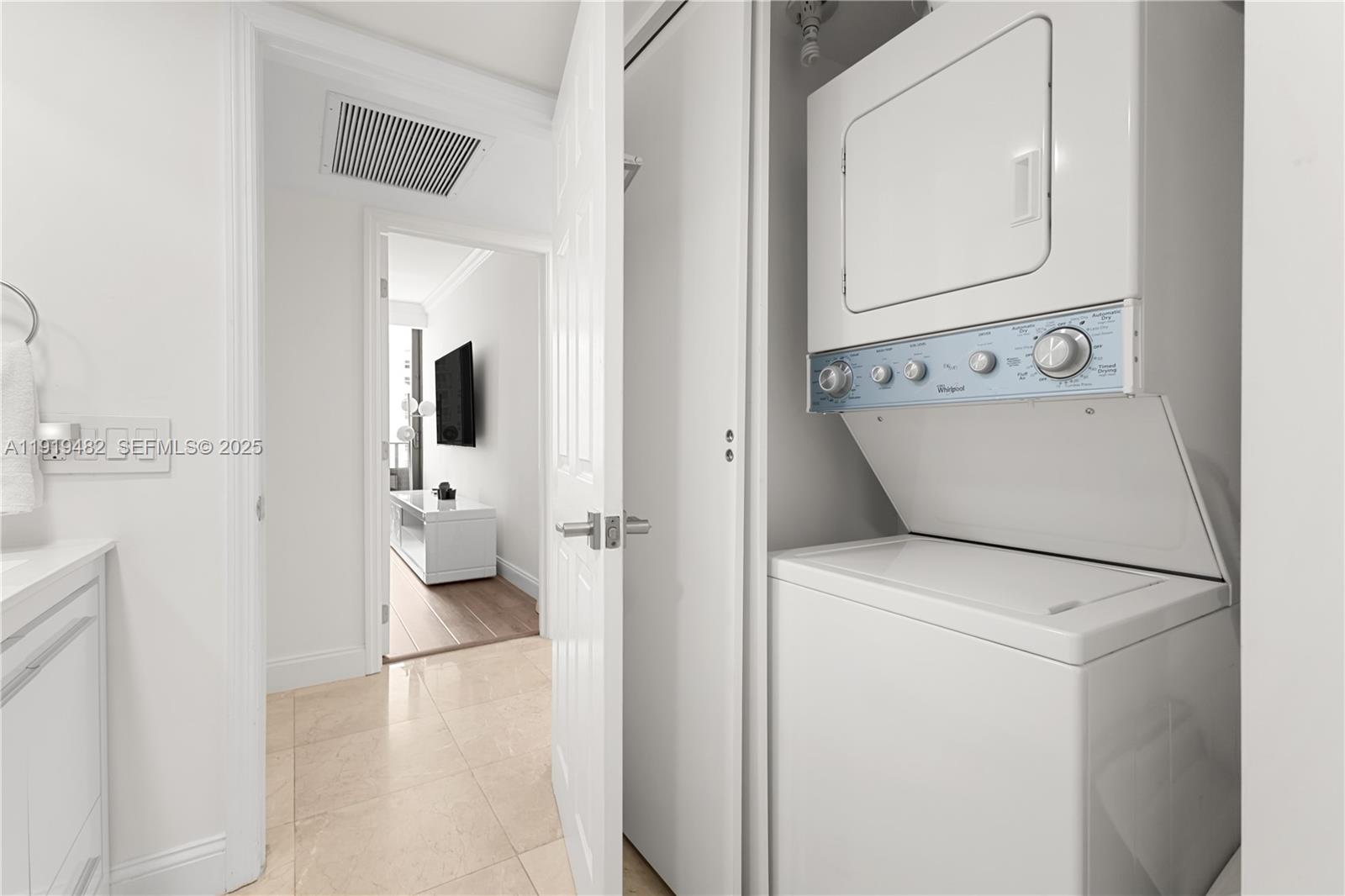 520 Brickell Key Drive, Unit A1207 Miami, FL 33131 - Photo 26 of 33 a view of washer and dryer