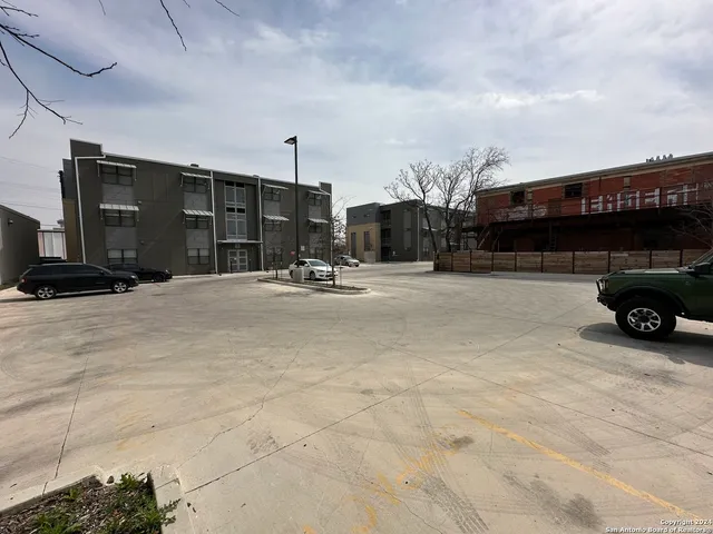 a view of a street with cars