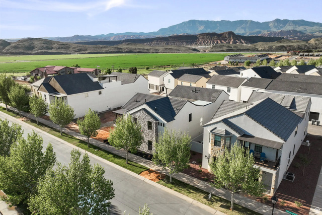 4346 Canterbury Road Hurricane, UT 84737 - Photo 17 of 37 Aerial view of residential area with a mountain backdrop