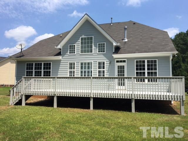 3324 Queensland Road Raleigh, NC 27614 - Photo 24 of 25 The view of the back of the home. Enjoy the outdoors on the large deck.