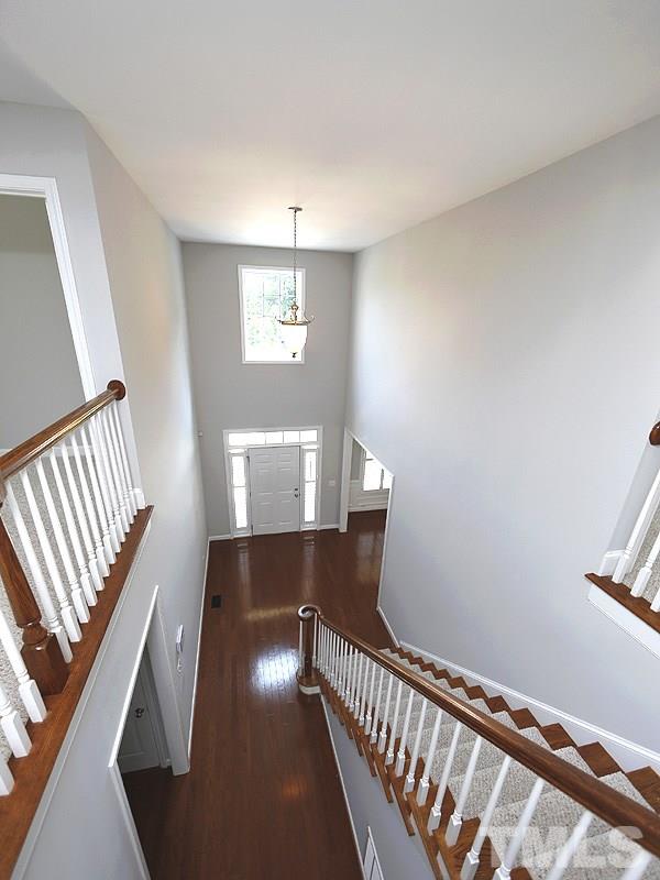 3324 Queensland Road Raleigh, NC 27614 - Photo 3 of 25 The volumous entry is bright and welcoming.