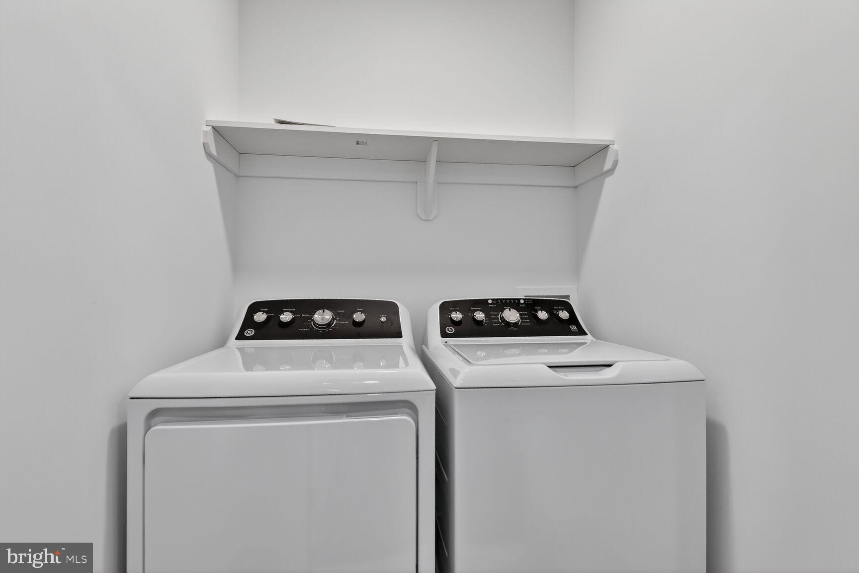 13102 Ideal Drive Silver Spring, MD 20906 - Photo 30 of 48 a utility room with dryer and washer