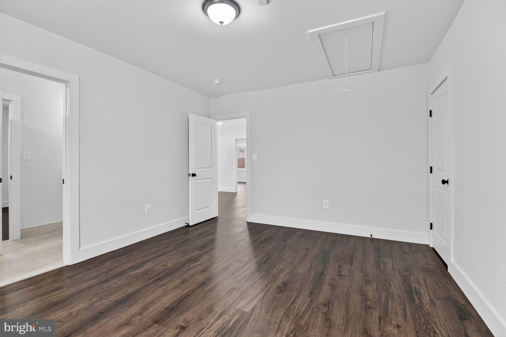 13102 Ideal Drive Silver Spring, MD 20906 - Photo 32 of 48 a view of an empty room with wooden floor