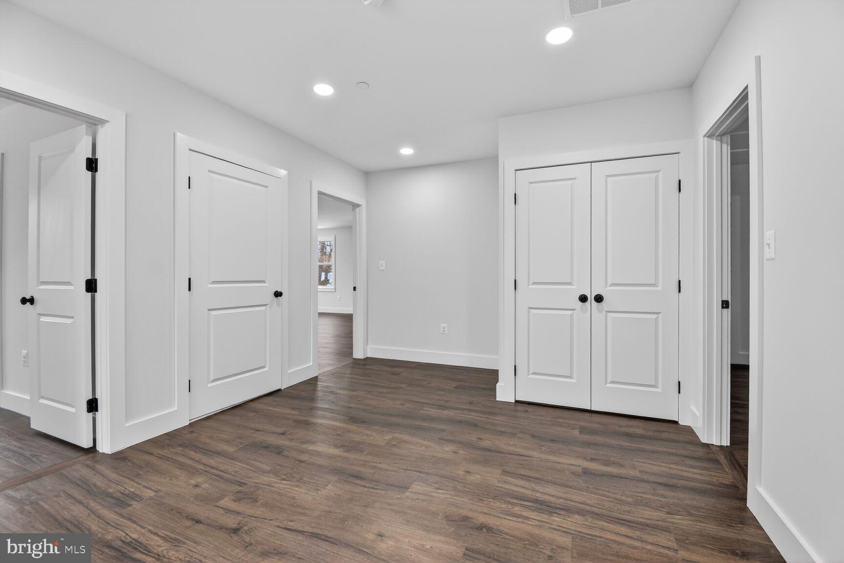 13102 Ideal Drive Silver Spring, MD 20906 - Photo 36 of 48 a view of empty room with wooden floor