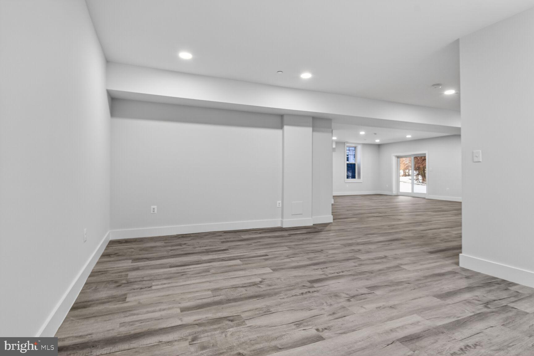 13102 Ideal Drive Silver Spring, MD 20906 - Photo 41 of 48 a view of an empty room with wooden floor