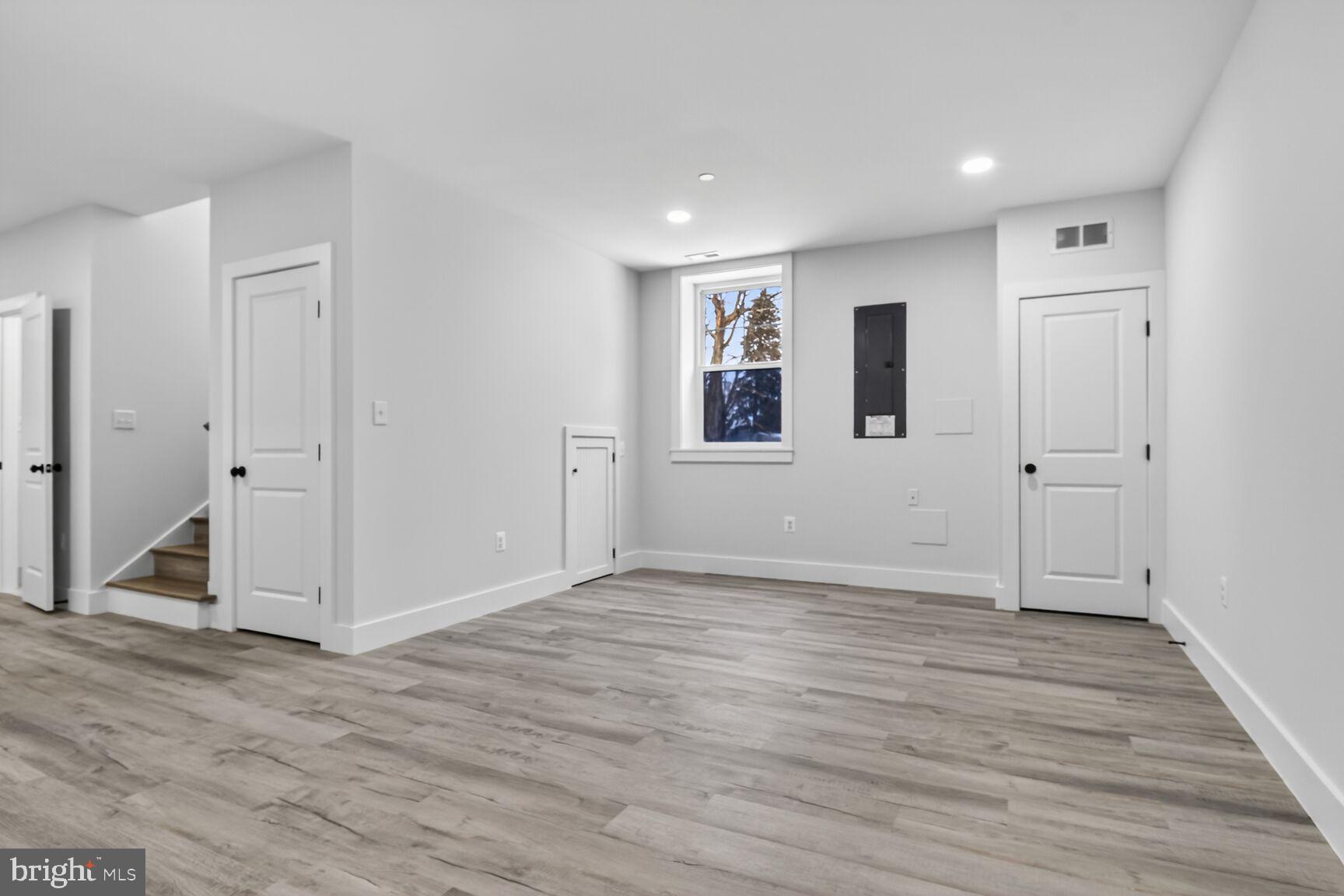 13102 Ideal Drive Silver Spring, MD 20906 - Photo 42 of 48 a view of empty room with wooden floor