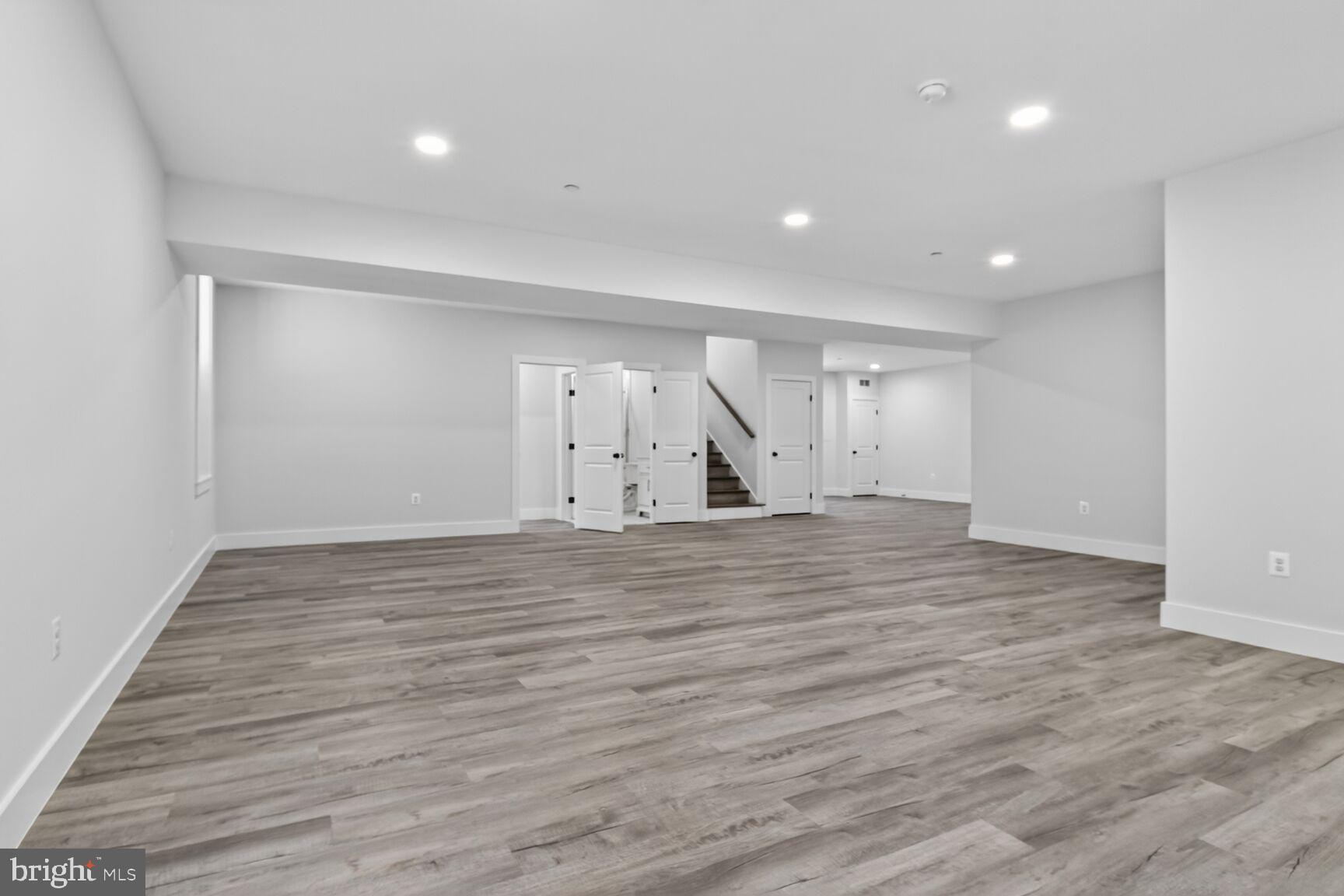 13102 Ideal Drive Silver Spring, MD 20906 - Photo 43 of 48 a view of empty room with wooden floor