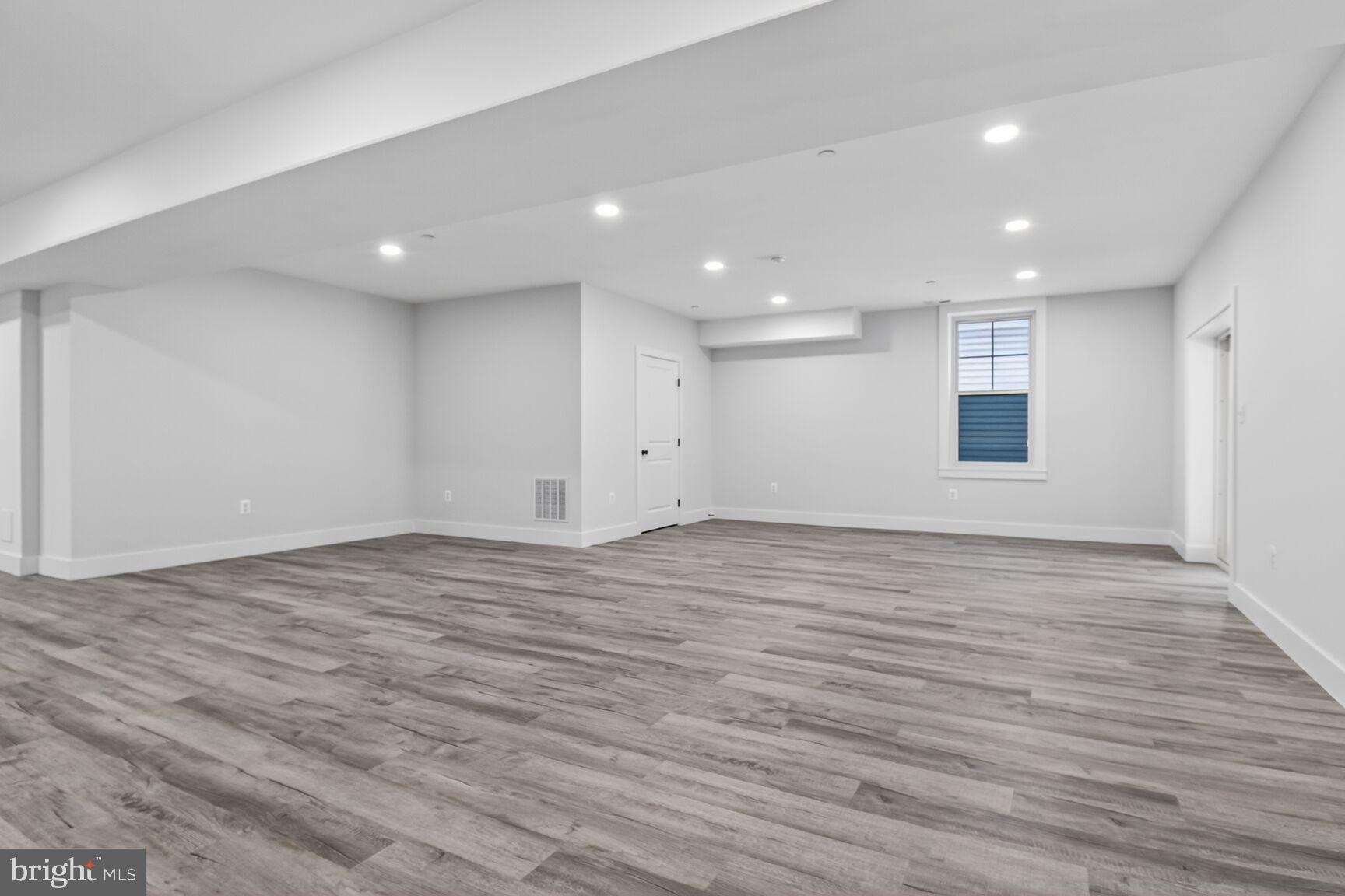 13102 Ideal Drive Silver Spring, MD 20906 - Photo 44 of 48 a view of empty room with wooden floor