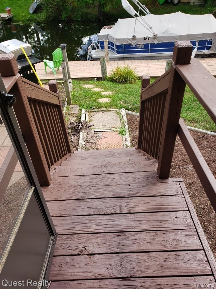 7045 Andersonville Road Clarkston, MI 48346 - Photo 10 of 36 rear deck to dock.