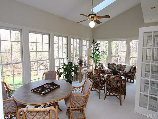 11005 Harness Circle Raleigh, NC 27614 - Photo 9 of 12 The sun room runs along the back of the house and opens to the family room. Sit out here and enjoy the privacy of your backyard and the beauty of nature. Sun Room