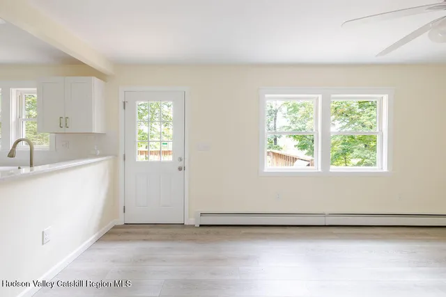 a view of a room that has a sink in it