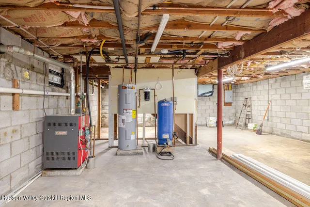 a view of a room with wooden shelves