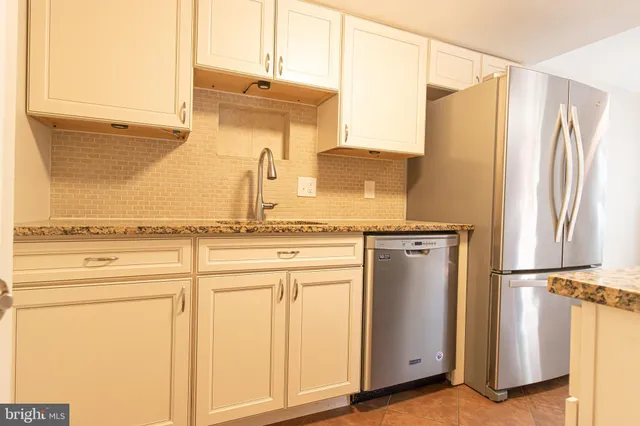 a view of a kitchen with a sink